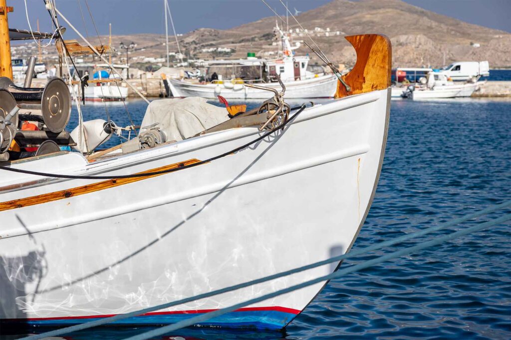 fishing boat anchored at naousa old harbor paros 2023 11 27 04 52 26 utc.jpg