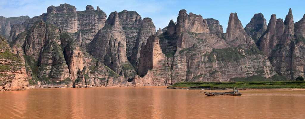 bringing a boat in the yellow river in china