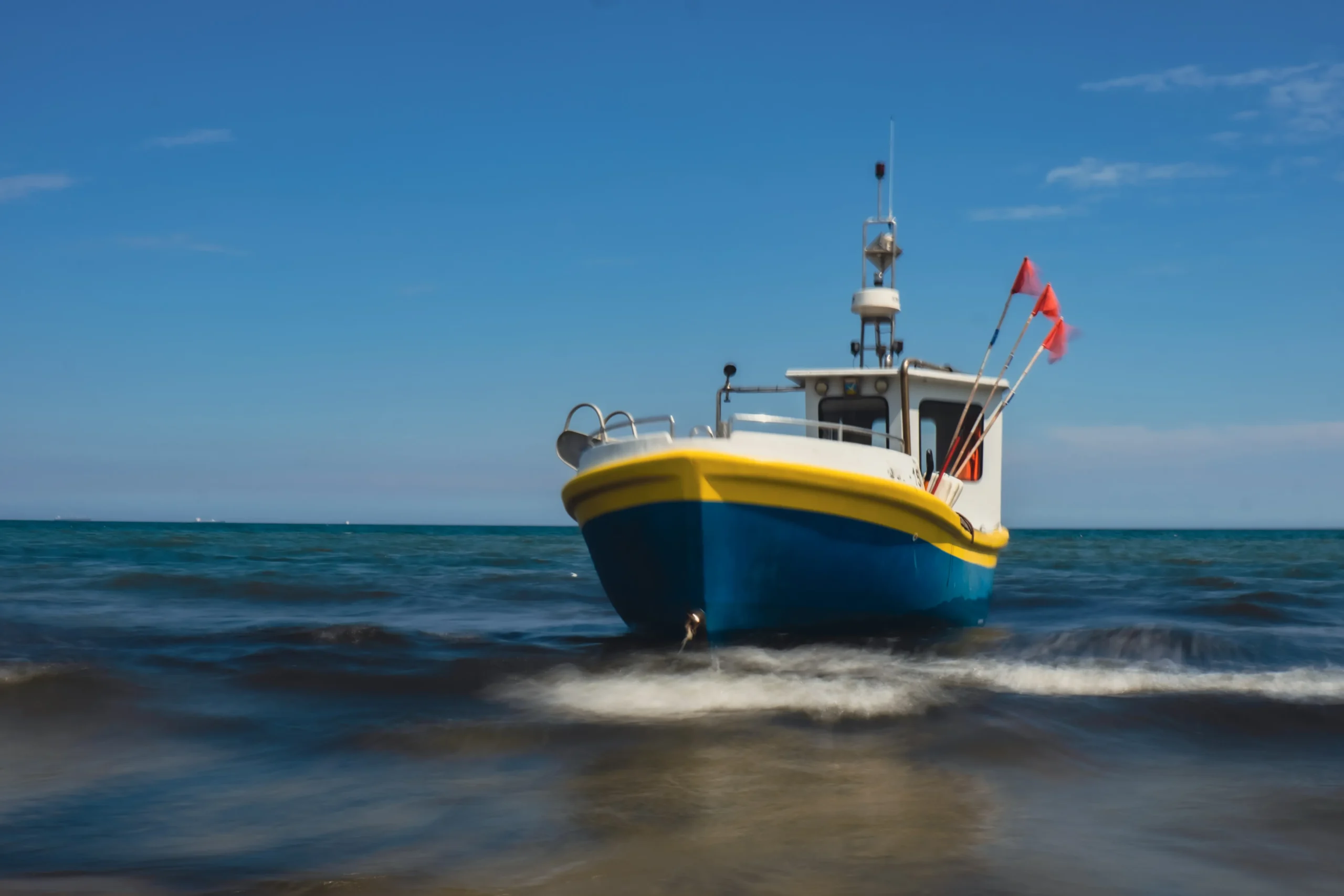 how should you pass a fishing boat