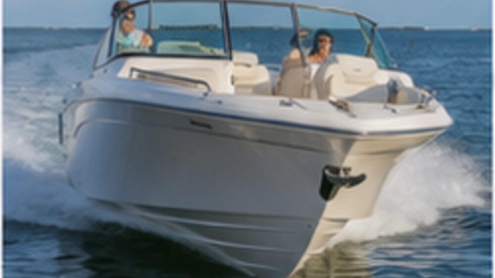 grady white freedom series freedom 235 rear quarter running 03
