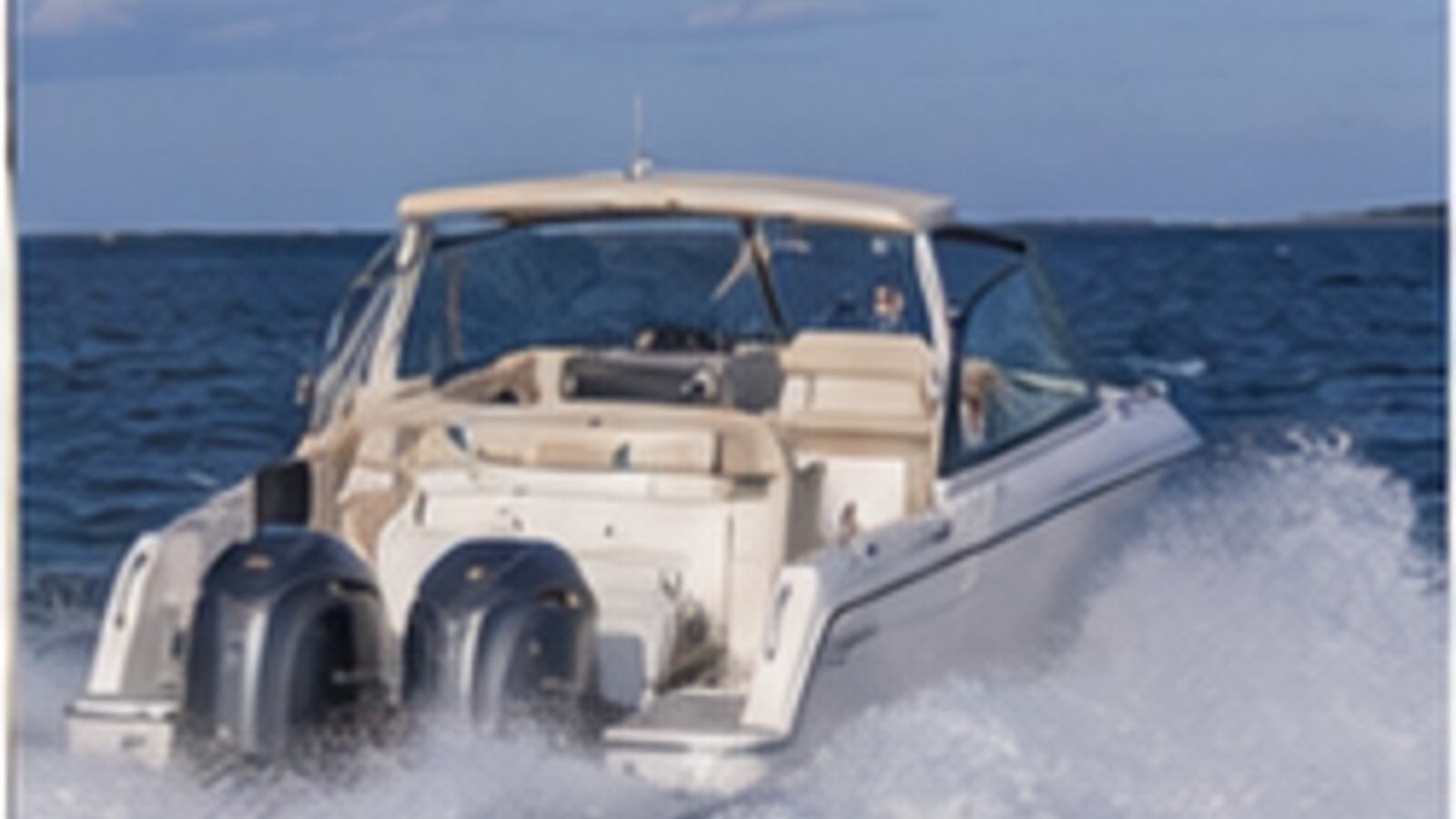 grady white freedom series freedom 325 rear quarter running 03