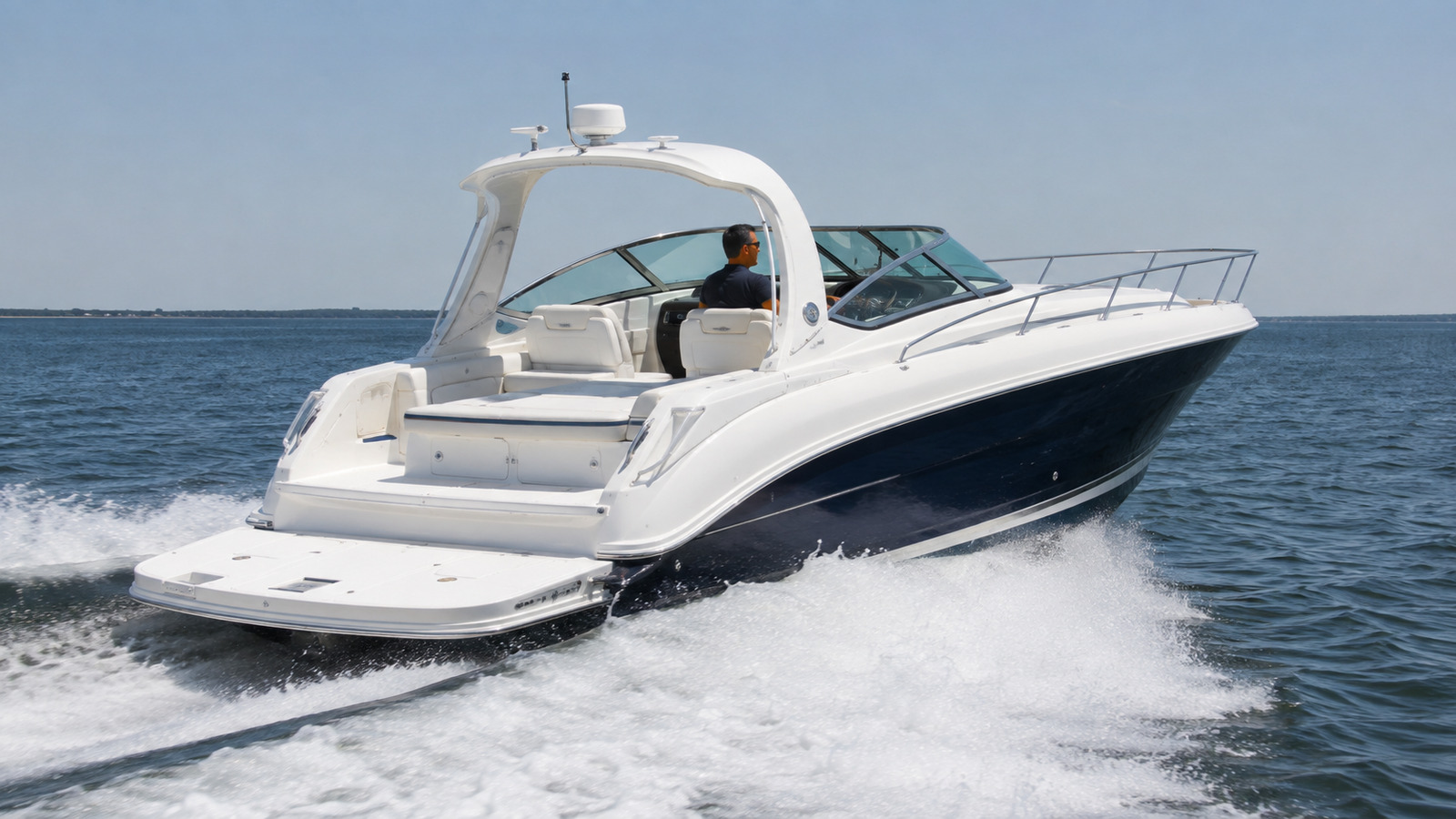 sea ray 330 express cruiser rear quarter running 03