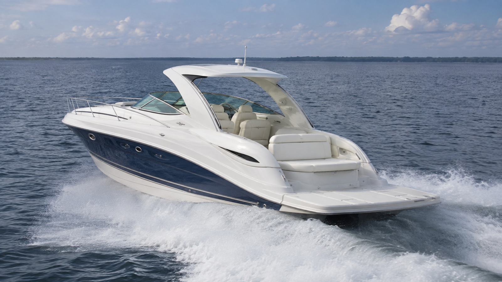 sea ray 370 express cruiser rear quarter running 03