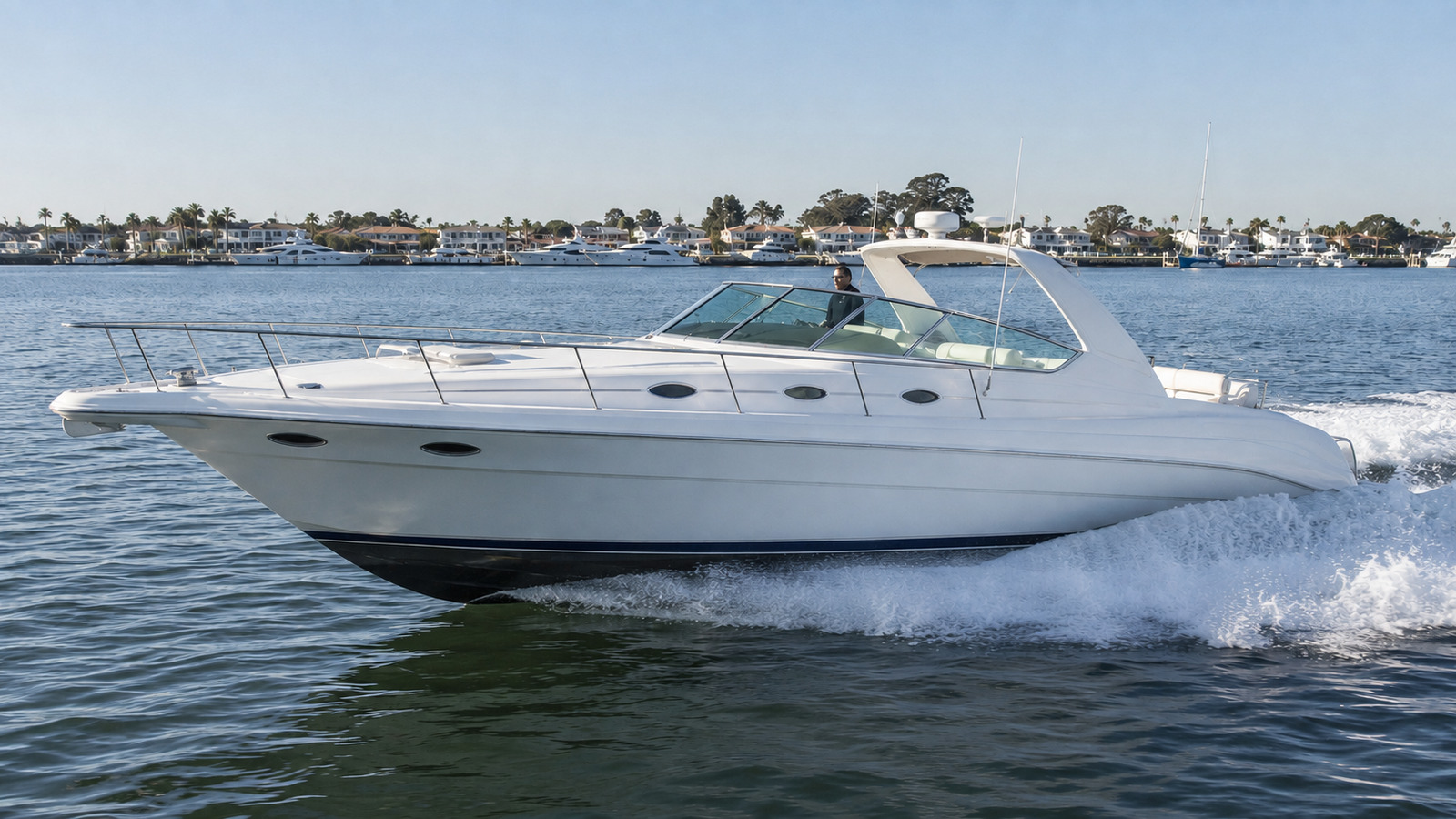 sea ray 440 express cruiser front quarter running 02