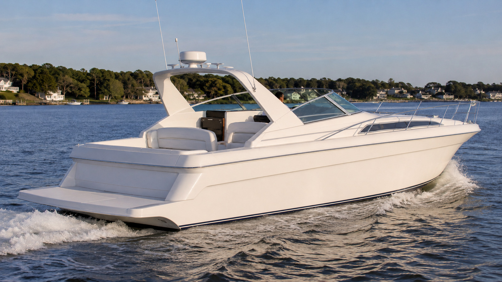 sea ray 440 express cruiser rear quarter running 03