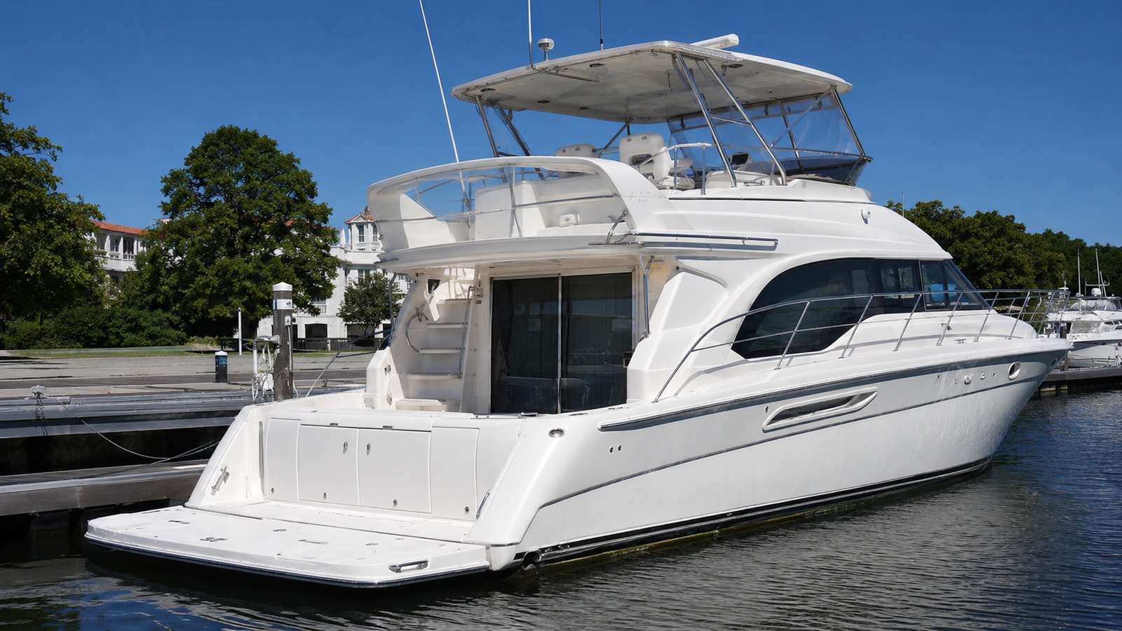 sea ray 480 sedan bridge stern quarter dockside 09