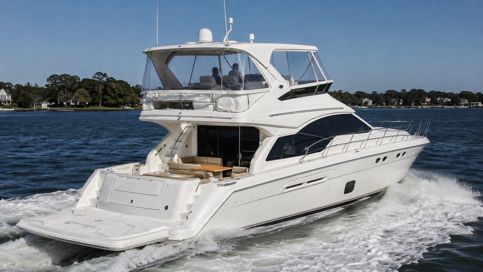 sea ray 520 sedan bridge rear quarter running 03
