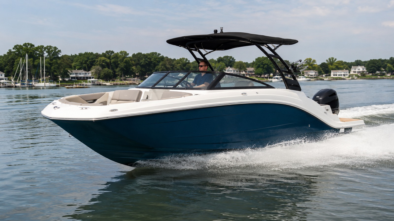 sea ray sdx 230 outboard front quarter running 02