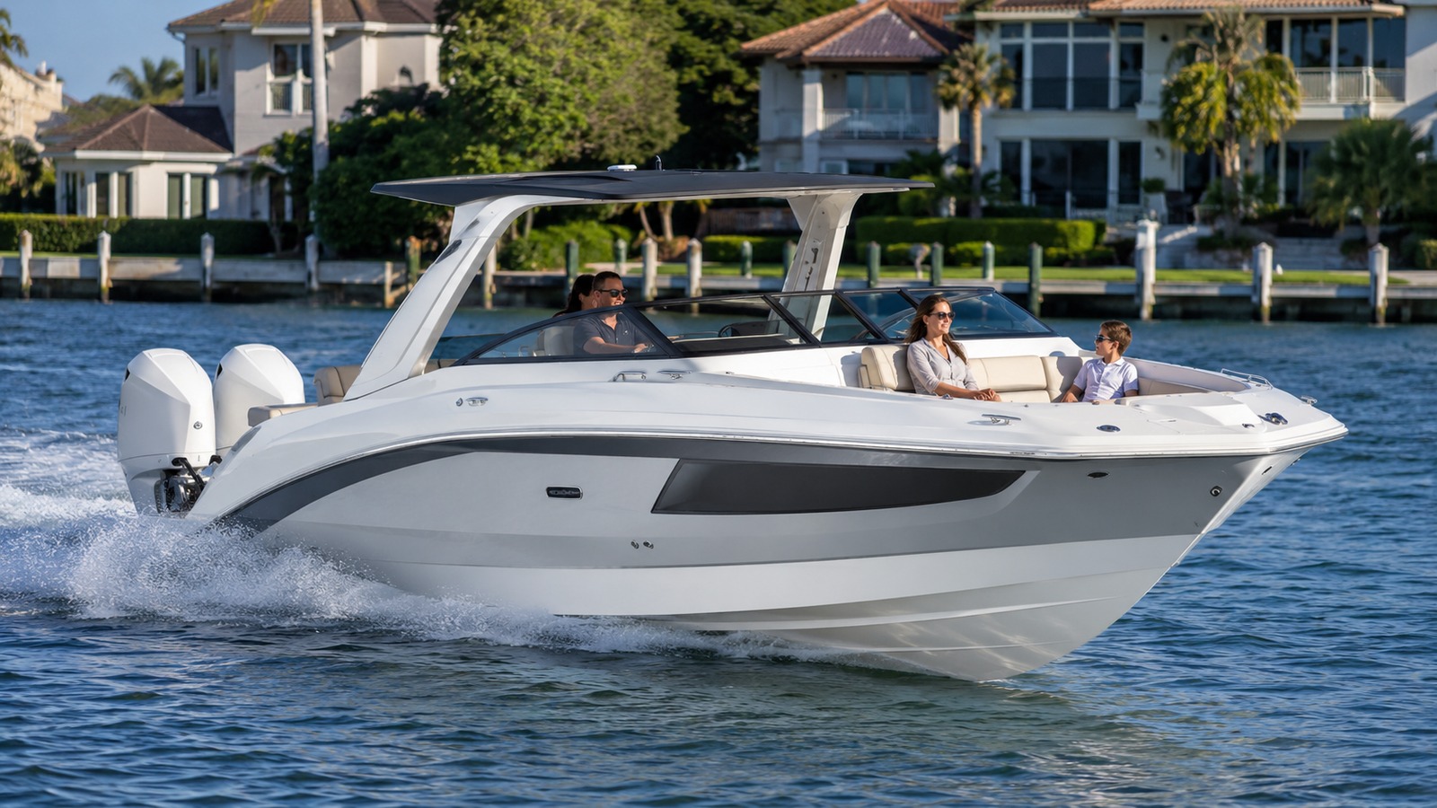 sea ray slx 310 outboard front quarter running 02
