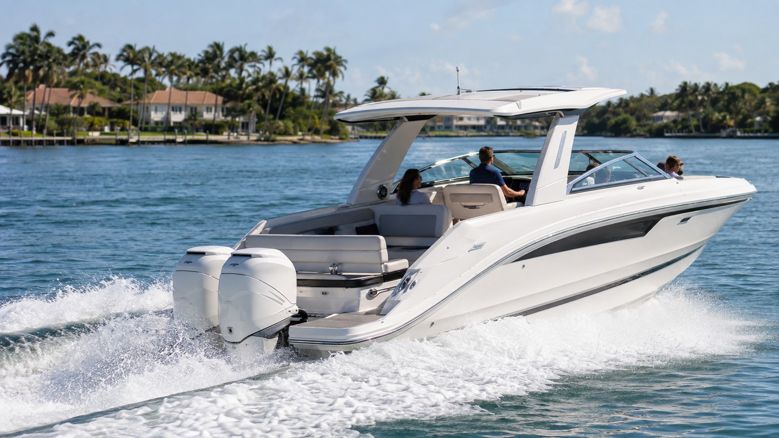 sea ray slx 310 outboard rear quarter running 03
