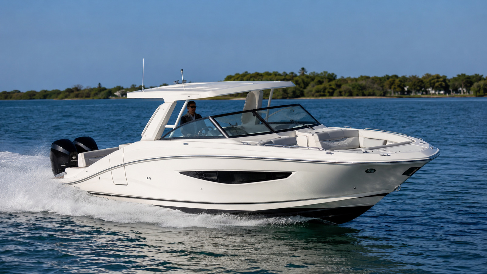sea ray sundancer 320 outboard front quarter running 02