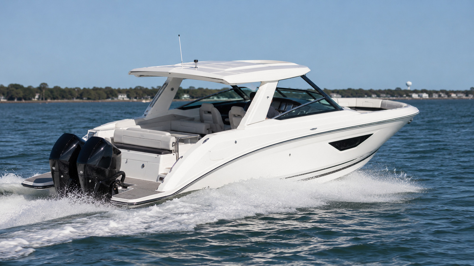 sea ray sundancer 320 outboard rear quarter running 03