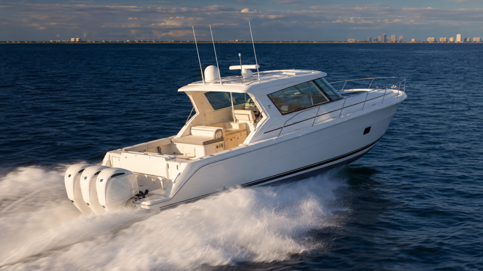 pursuit boats offshore os 405 rear quarter running 03