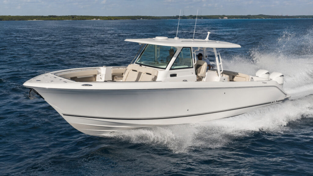 pursuit boats s 328 front quarter offshore running 02